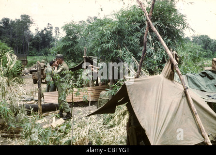 11th ACR camp near quan Loi GIs LTC Trobrough's photos of the 11th ACR and elements of the 1st Cavalry Division - including helicopters of the 1st Squadrond, 9th Cavalry at Quan Loi and the surrounding area of operations in III Corps in Vietnam. Trobough was a chaplain. Stock Photo