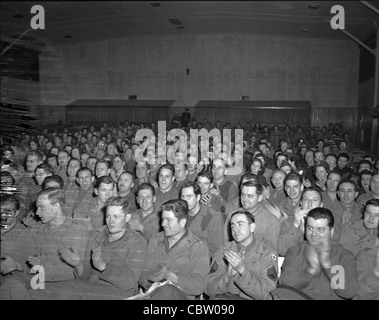 American GIs watching movie in basement during WWII war time england britain entertainment US troops