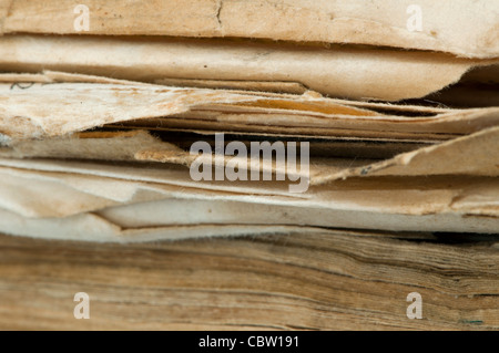 Old worn paper sheets of book Stock Photo