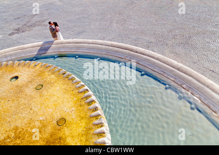 Couple water fountain Piazza del Popolo Rome Italy Stock Photo