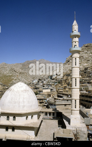 Kurdish town of Aqra, Iraqi Kurdistan with terraced houses and mosque. Stock Photo