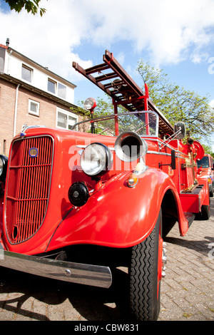 Old fire engine on street in The Netherlands Stock Photo