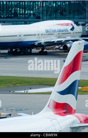 British Airways aircraft at Terminal 5 of Heathrow airport, London, England. Stock Photo