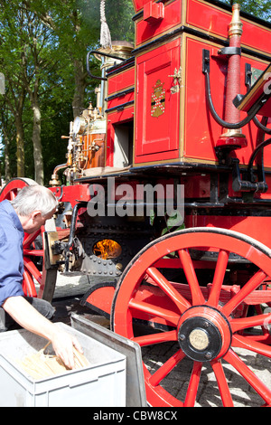 Very old fire engine on street in The Netherlands Stock Photo