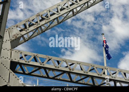 The Australian flag flies from the top of the Story Bridge in Brisbane Stock Photo