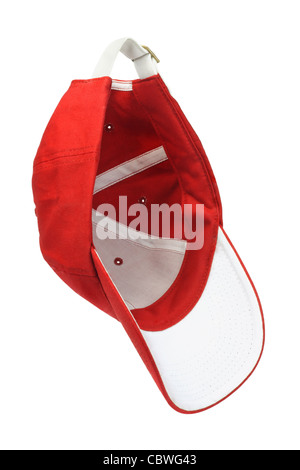 Red baseball cap hanging in the air on white background Stock Photo