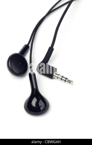 Black audio earphone and jack on white background Stock Photo