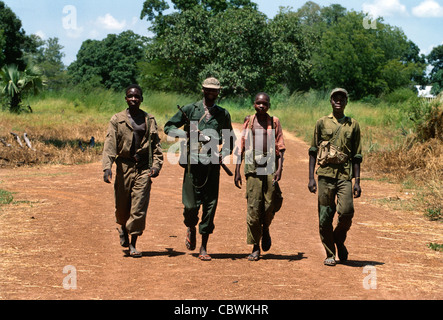 Teenage Sudanese soldiers, members of the Sudan People's Liberation Army, Southern Sudan, Africa pictured patrolling a remote area near Yei, in 1997 Stock Photo