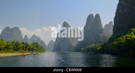 Panorama of bamboo forest and tall karst peaks along the Lijiang River Guangxi province Peoples Republic of China Stock Photo