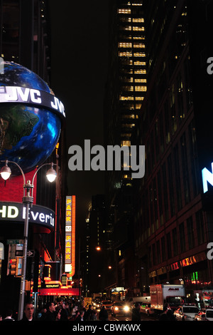 Night neon portrait JVC Globe, cars, people, skyscrapers, West 4rd Street from 7th Avenue, Times Square, New York Stock Photo