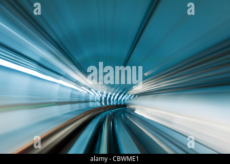 Train moving in subway tunnel Stock Photo