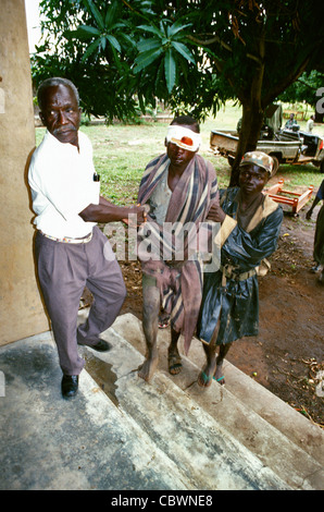 Wounded Sudan Peoples Liberation army soldier who has been shot during a confrontation with  northern Sudanese army troops being taken to a hospital in Southern Sudan during the civil war in 1997 Stock Photo