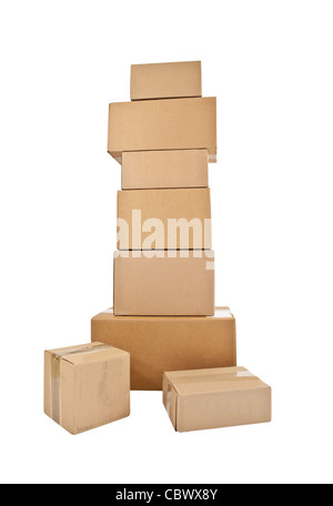 Tall stack of shipping boxes isolated on white. Stock Photo