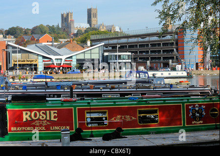 Narrowboats in Brayford Pool and the  waterfront in Lincoln Stock Photo