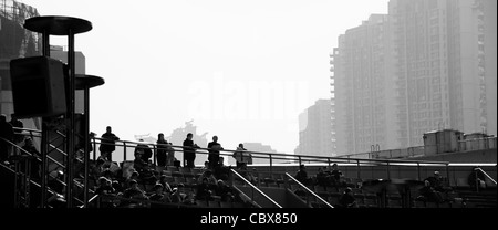 Sha Tin, Hong Kong. Spectators at the race track of the Hong Kong Jockey Club. Stock Photo