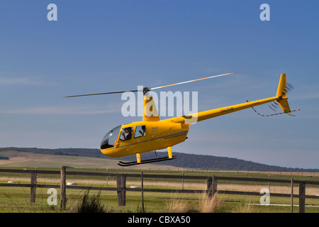 Helicopter taking off for scenic tour of the Twelve Apostles, Victoria, Australia Stock Photo