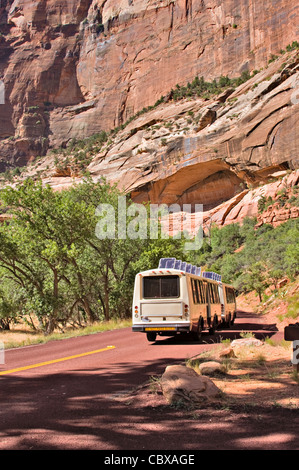 Shuttle Bus in Zion Canyon, Utah. A shuttle bus leaves the stop at Weeping Rock in Zion Canyon, Zion National Park. Stock Photo