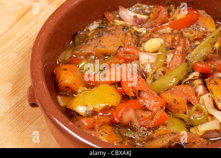 Traditional Spanish vegetable stew, pisto, served in a clay pot Stock Photo