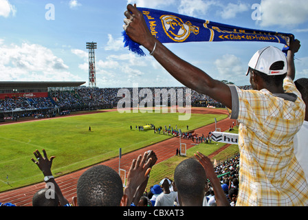 Football fans in the stadium in Freetown, Sierra Leone, for an African Cup of Nations match vs Egypt Stock Photo