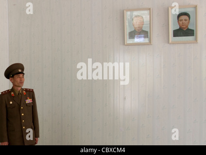 SOLDIER IN A ROOM, NORTH KOREA Stock Photo