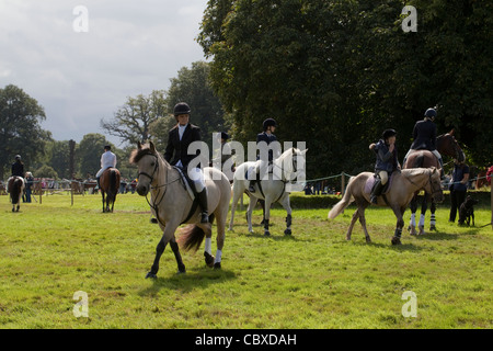 Aylsham Agricultural Show, Norfolk. August Bank Holiday Monday. Riders warming up before event. Stock Photo
