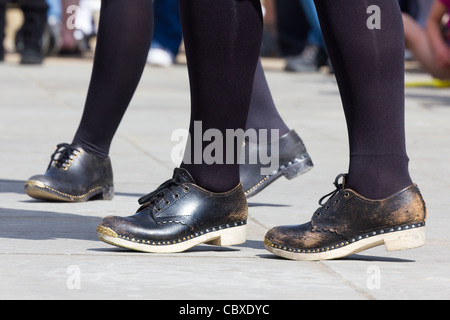 Traditional black clogs at the 2011 Whitby Folk week Stock Photo