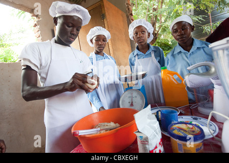 Students attend a culinary arts class in Morogoro, Tanzania, East Africa. Stock Photo