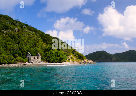 ST JOHN, US Virgin Islands - Abandoned stone structure on the shore of Whistling Cay, a small island off St. John in the US Virgin Islands. Stock Photo