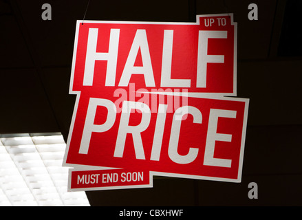 A Half Price sale sign in a UK store Stock Photo