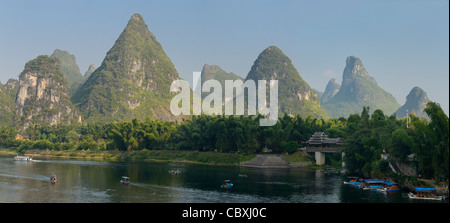 Panorama of Karst limestone cone peaks surrounding the Li or Lijiang river at Yangshuo Peoples Republic of China Stock Photo