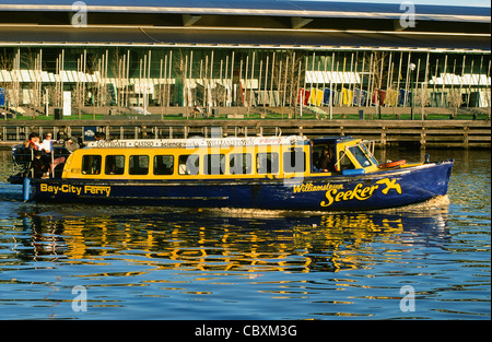 Excursion boat Williamstown Seeker cruising on the Yarra river in front of the Melbourne Exhibition Centre in Melbourne,Victoria Stock Photo