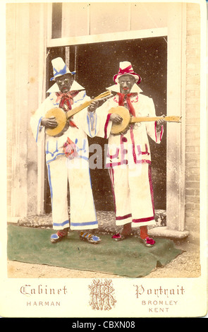 Cabinet photograph of two blacked-up minstrels Stock Photo