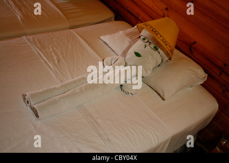 A towel man on our hotel bed. Stock Photo