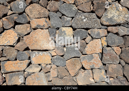 Volcanic stone wall, great for background and texture Stock Photo