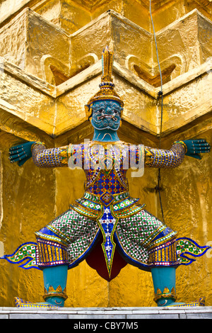 Giant stand around pagoda at wat prakeaw, Thailand Stock Photo