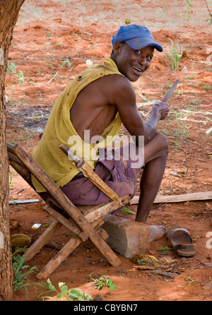 Cheery Kenyan farmer in the Sagalla district near Voi in southern Kenya Stock Photo