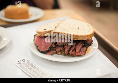 The famous pastrami on rye sandwich at Katz's Deli in New York City's Lower East Side, USA. A big sandwich. Stock Photo