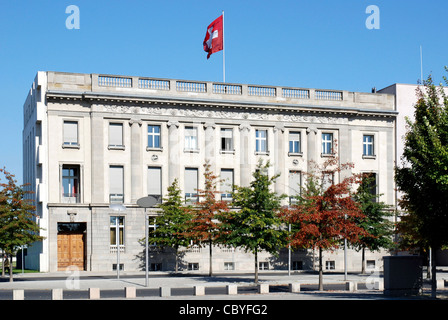 Embassy of Switzerland in Berlin with the Swiss national flag. Stock Photo