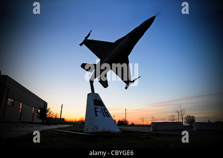 A scale model of an F-16 C Fighting Falcon is displayed in front of the Headquarters Building at the 177th Fighter Wing, NJANG on April 16th, 2009. The 177th Fighter Wing is located at Atlantic City IAP, NJ. Stock Photo