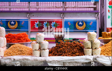 Indian sweet stall on a market . Andhra Pradesh, India Stock Photo