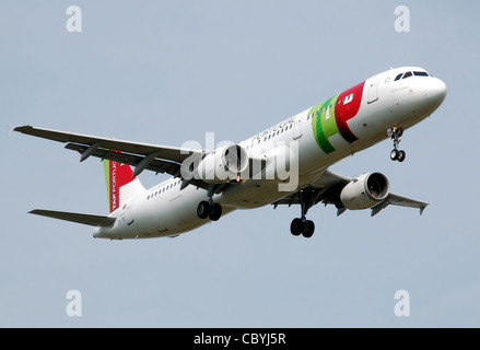 TAP Portugal Airbus A321-200 (CS-TJE) lands at London Heathrow Airport, England. Stock Photo