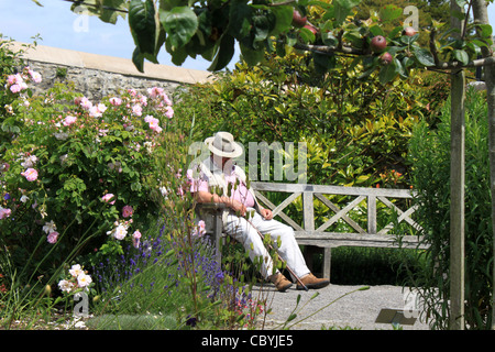 Relaxing in the Physic Garden Cowbridge Vale of Glamorgan  South Wales UK Stock Photo