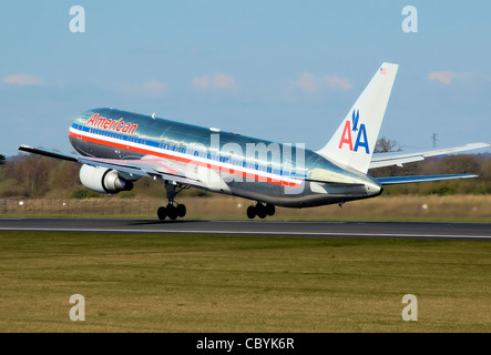 American Airlines Boeing 767-300ER (registration N366AA) takes off from Manchester Airport, England, for Chicago-O‘Hare, USA. Stock Photo