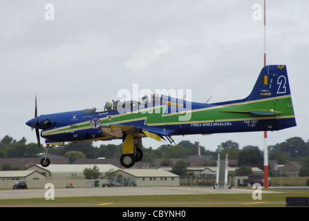 An Embraer EMB 312 Tucano of the Esquadrilha da Fumaça (the Brazilian Air Force display team) lands after practice, at the Royal Stock Photo