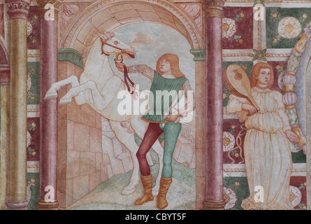 One of the many frescoes from the 15th century by Andrea Bellunello at the exterior of the castle of Spilimbergo, Italy. Stock Photo