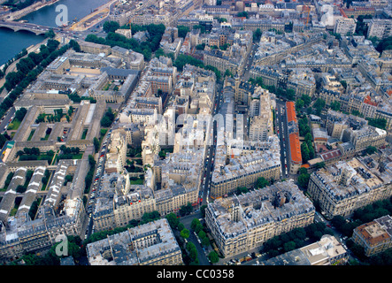 An aerial photograph literally shows a slice of the pie that makes up beautiful Paris, France, with its many regal buildings and tree-lined avenues. Stock Photo