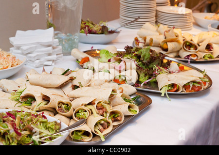 Savory Chinese pancake wraps on buffet table at a wedding reception in the UK Stock Photo