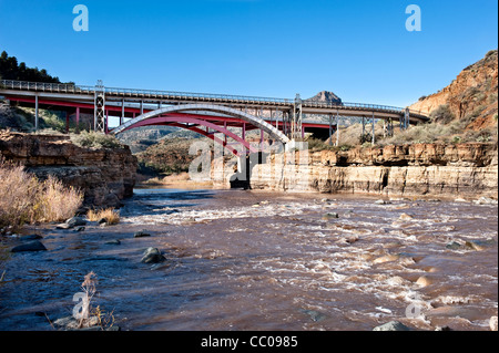 A bridge over a wilderness river in the high desert. Stock Photo