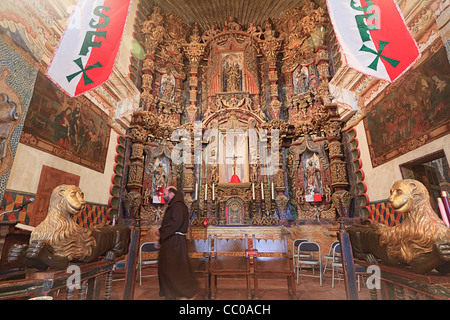 Ornate interior of Mission San Xavier del Bac, an historic Spanish, Catholic, Franciscan mission outside Tucson, AZ Stock Photo