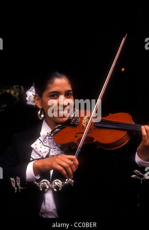 1, one, Mexican woman, Mexican, woman, violinist, playing violin, violin, violin player, musician, mariachi band, Tlaquepaque, Jalisco State, Mexico Stock Photo